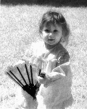 Little girl with fan